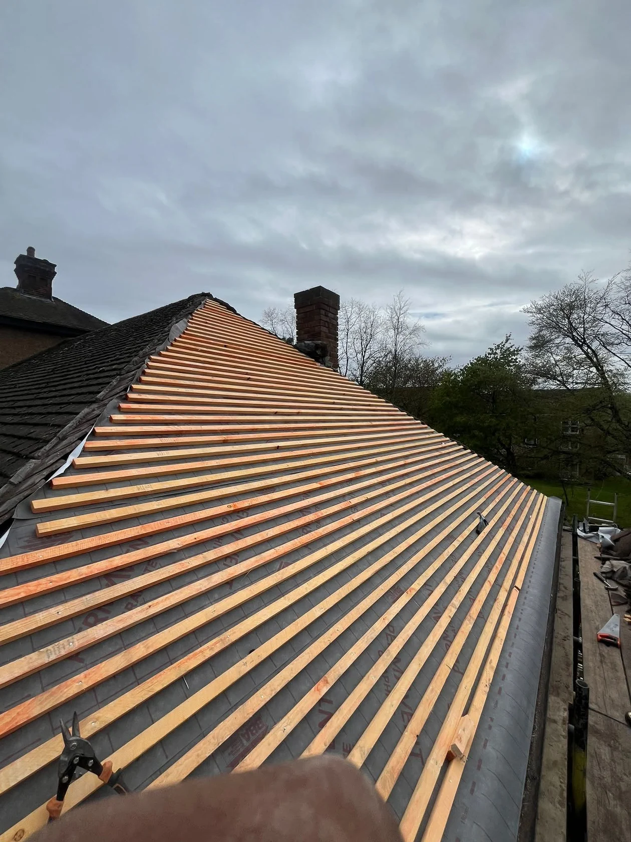 New battens installed above roofing underlay